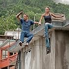 Jordana Brewster and Paul Walker in Fast Five (2011)