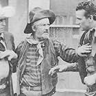 John Wayne, George 'Gabby' Hayes, and LeRoy Mason in Rainbow Valley (1935)