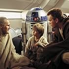 Ewan McGregor, Liam Neeson, Jake Lloyd, and Kenny Baker in Star Wars: Episode I - The Phantom Menace (1999)