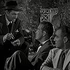 Morris Ankrum, Dick Foran, and Richard Lane in Ride 'Em Cowboy (1942)