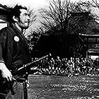 Toshirô Mifune and Isuzu Yamada in Yojimbo (1961)
