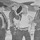 John Wayne, Stanley Blystone, Ray Corrigan, and Max Terhune in Red River Range (1938)