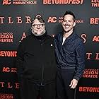 Scott Cooper and Guillermo del Toro at an event for Antlers (2021)