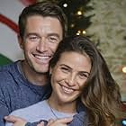 Robert Buckley and Ana Ayora in The Christmas House (2020)