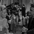 Richard Crenna and Cleo Moore in Over-Exposed (1956)