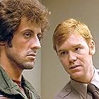 Sylvester Stallone and David Caruso in First Blood (1982)