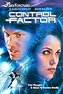 Adam Baldwin and Elizabeth Berkley in Control Factor (2003)