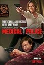 Erinn Hayes and Rob Huebel in Medical Police (2020)