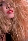 Tawny Kitaen in Whitesnake: The Deeper the Love (1990)