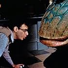 Rick Moranis and Levi Stubbs in Little Shop of Horrors (1986)