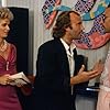 Phil Collins and Martin Ferrero in Miami Vice (1984)