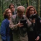 Gillian Anderson, David Duchovny, Colleen Flynn, and Anthony Rapp in The X-Files (1993)