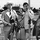 Claudette Colbert, Ben Lyon, and George Sidney in For the Love of Mike (1927)