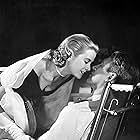Grace Kelly and James Stewart in Rear Window (1954)