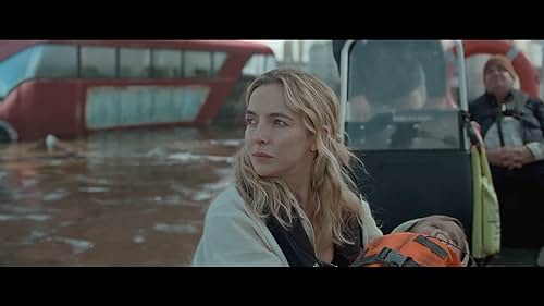 A woman who along with her newborn try to find their way home as environmental crisis that submerges London in flood waters and sees a young family torn apart in the chaos.