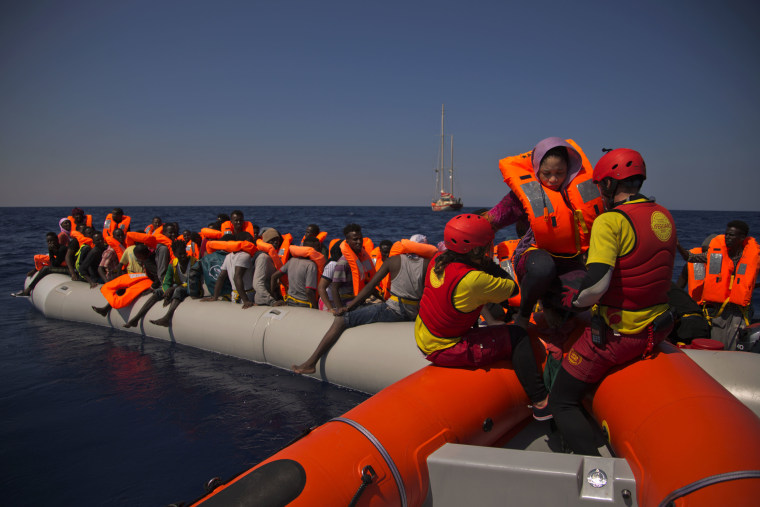 Image: Migrants from Nigeria fleeing Libya are rescued by emergency teams