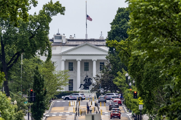 The flag at the White House is flown at half-staff on May 7, 2023.