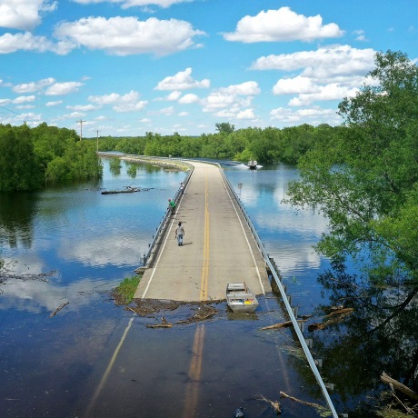 Floodwater from the Mississippi River cuts off the roadway from Missouri into Illinois at the states' border on May 30, 2019