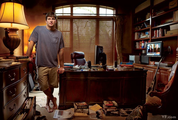 Image may contain Furniture Human Person Michael Burry Indoors Chair Room Table Bookcase and Desk
