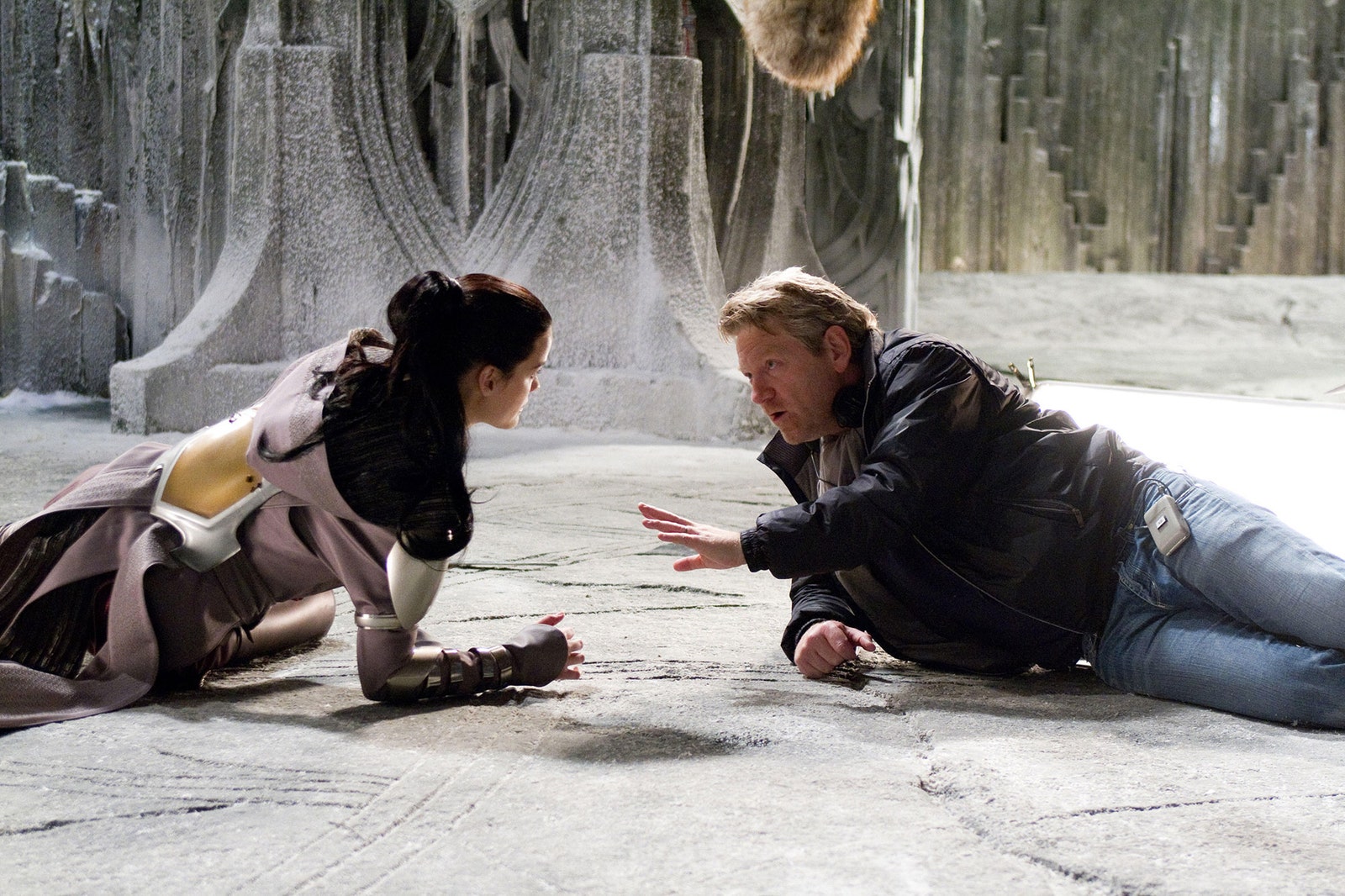 Jaimie Alexander  discusses a scene with director Kenneth Branagh on the set of THOR.