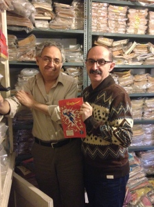 With Henry Matthews and his collection of comics. 