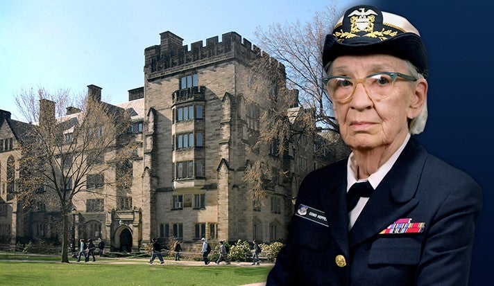 Grace Murray Hopper in Navy uniform with Hopper College in the background. 