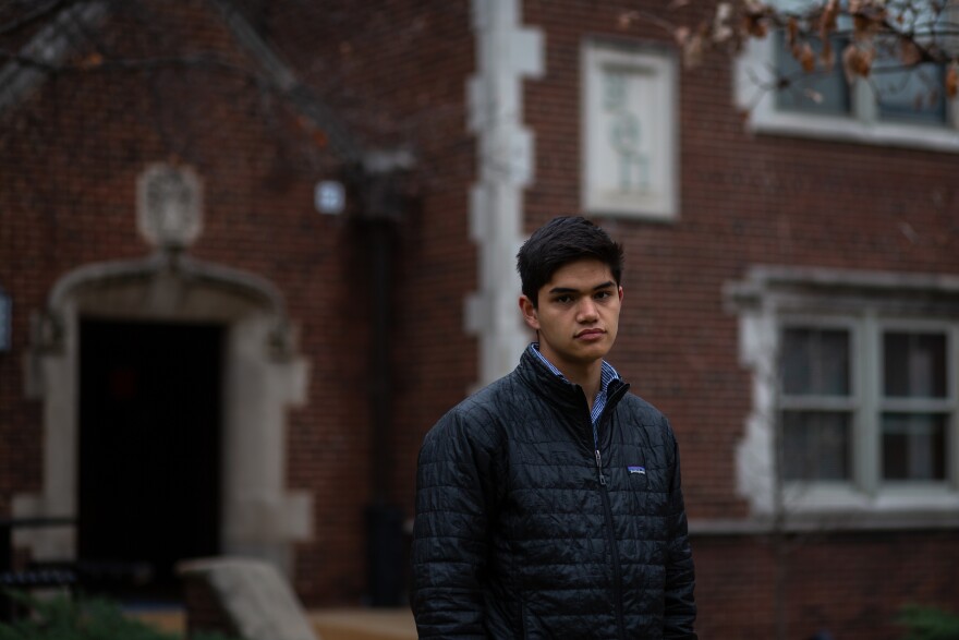 Washington University senior John Harry Wagner stands in front of his old fraternity house, Beta Theta Pi, on March 16, 2021. Wagner quit along with most of the brothers during a racial reckoning centered on Greek life.