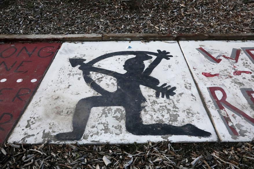 Native American imagery is painted along a walkway at Bountiful High School.
