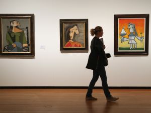 Three Picasso paintings on exhibit.