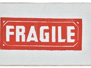Print that shows the world "Fragile" in red box