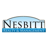 The "Nesbitt Realty and Management" user's logo