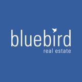 The "Bluebird Real Estate" user's logo