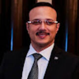 The "الدكتور/ حسن الحايس، مستشار قانوني في دبي" user's logo