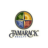 The "TamarackRealty" user's logo