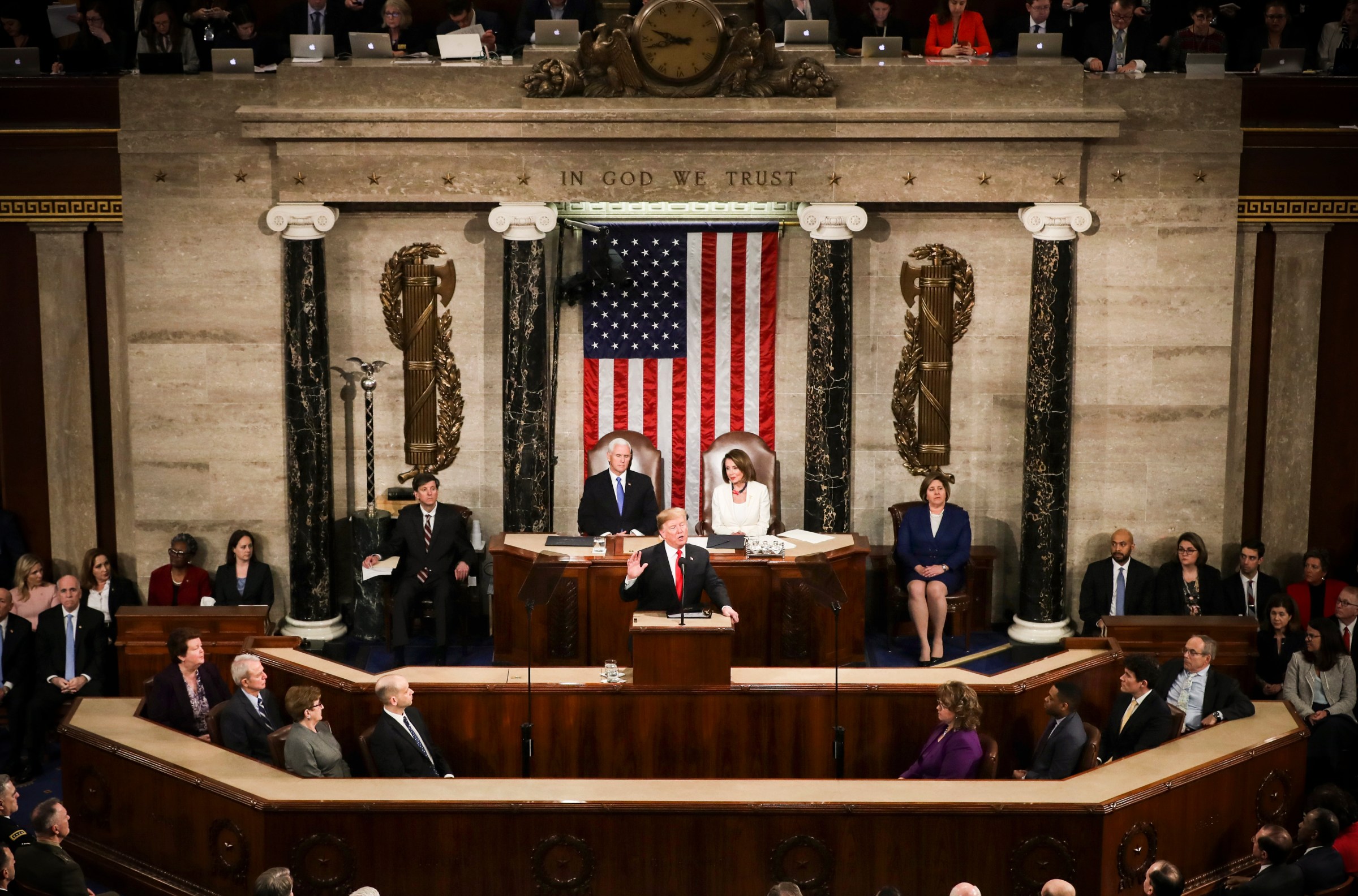 President Trump, with Speaker Nancy Pelosi and Vice President Mike Pence looking on, delivers the State of the Union address.