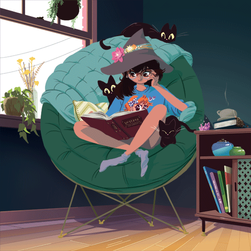 girl reading with cats