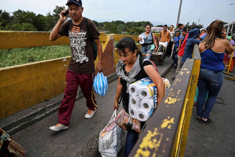 PHOTO: Venezuelans cross the Simon Bolivar brige in San Antonio del Tachira, Tachira State, Venezuela, on the border with Colombia, Feb. 20, 2019.