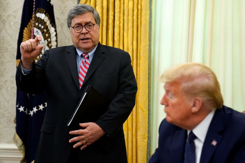 PHOTO: President Donald Trump listens as Attorney General William Barr speaks before Trump signs an executive order aimed at curbing protections for social media giants, in the Oval Office of the White House, May 28, 2020, in Washington.
