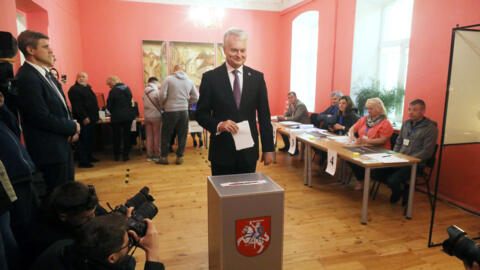 Lithuanian outgoing President Gitanas Nauseda prepares to vote in the first round of the presidential election on May 12, 2024 in Vilnius.