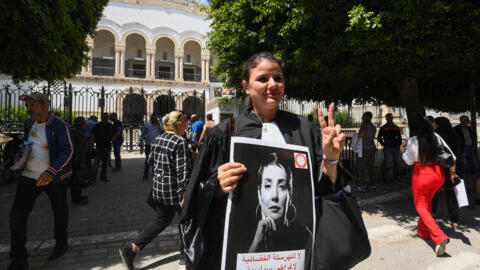 Lawyers rally in front of the Tunis Court on May 13, 2024 as the Tunisian bar association declared a strike  to protest against security forces premises to arrest Sonia Dahmani on May 11.