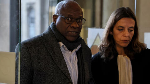 File photo: Rwandan doctor Sosthene Munyemana (L) arrives with his lawyer Florence Bourg (R) at the Paris courthouse on November 14, 2023