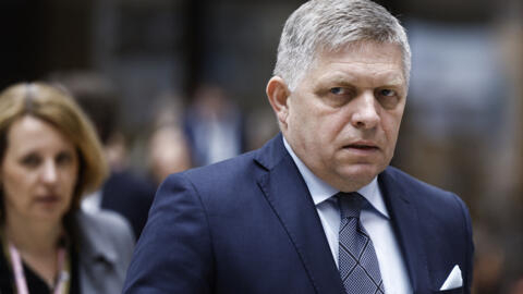 Slovakia's Prime Minister Robert Fico walks during the European Council summit at EU headquarters in Brussels on April 18, 2024. 