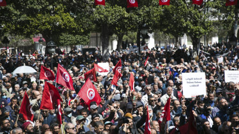 Demonstrators gather during a protest against Tunisian President Kais Saied, in Tunis, Tunisia on  April 10, 2022. 