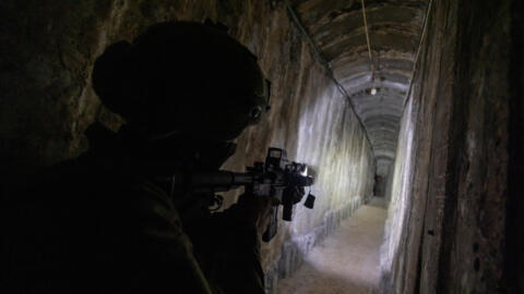An Israeli soldier secures a tunnel underneath Al Shifa Hospital, amid the ground operation of the Israeli army against Hamas, in the northern Gaza Strip, November 22, 2023.