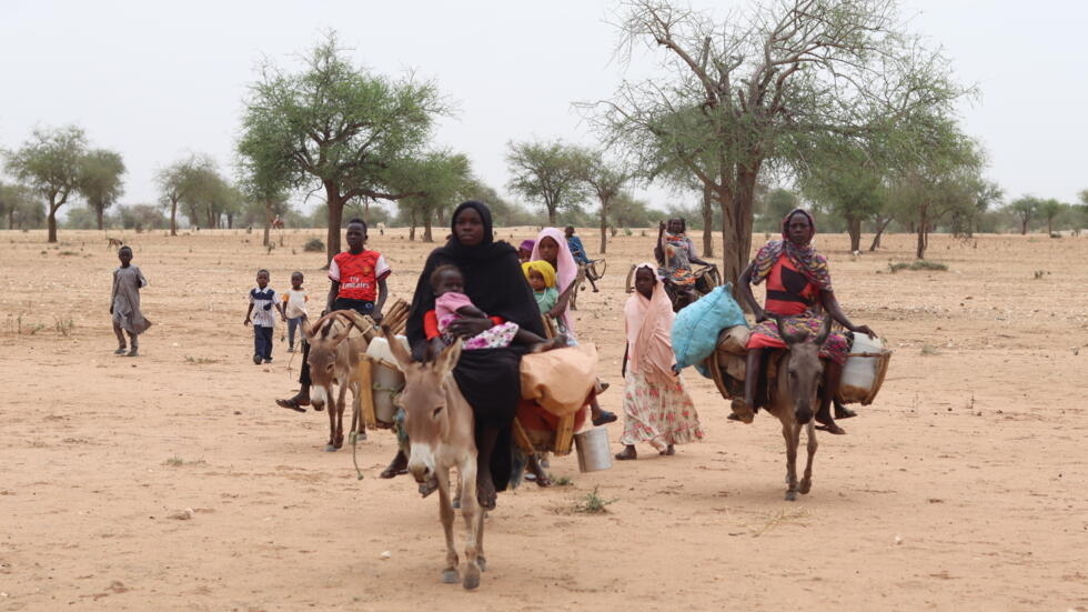 Sudanese refugees cross into Chad near Koufroun, Echbara, in May 2023: the latest arrivals are bring reports of new artocities in the country's civil war
