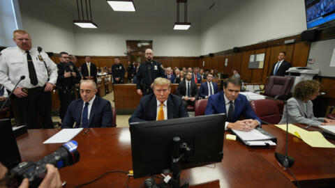 In this file photo, former US president Donald Trump sits in the courtroom as he arrives for his trial for allegedly covering up hush money payments at Manhattan Criminal Court on May 21, 2024.