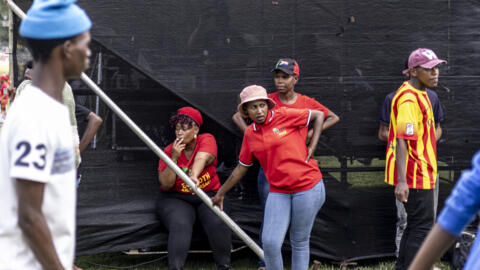 A group of young people gather at the Economic Freedom Fighters (EFF) Youth Voter Bash at Zoo Lake in Johannesburg on 9 December 2023.