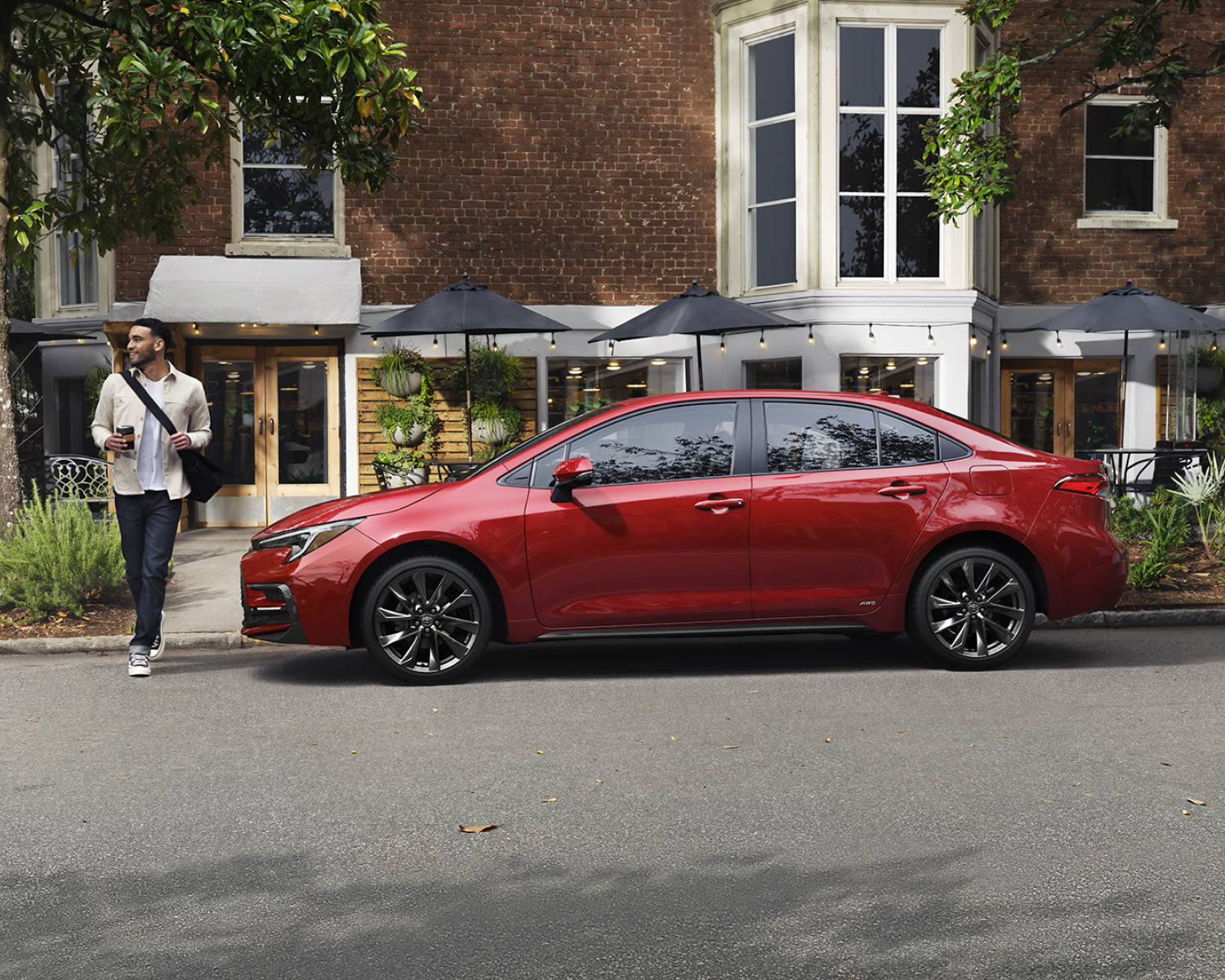 Corolla Hybrid XSE AWD Shown in Ruby Flare Pearl