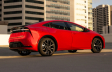 Prius Prime XSE shown in Supersonic Red