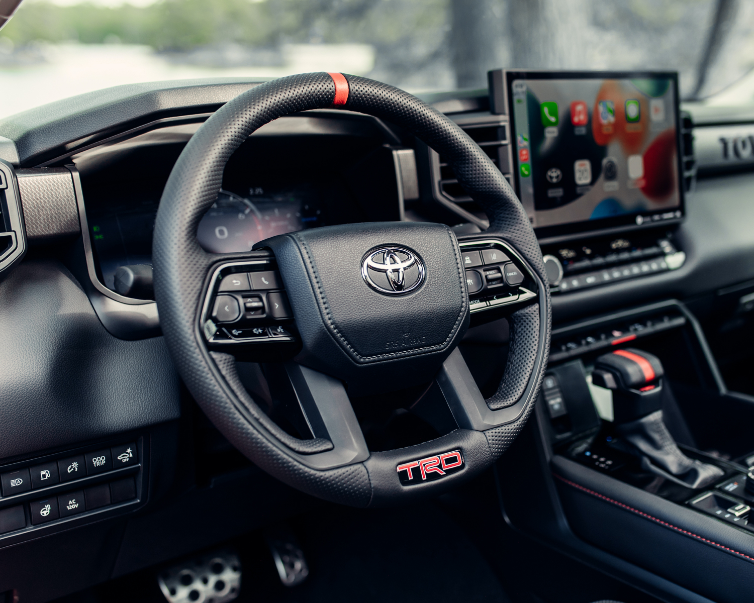 Tundra Hybrid CrewMax TRD Pro interior shown in Black SofTex 